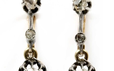 A pair of silver and gold rose cut diamond earrings