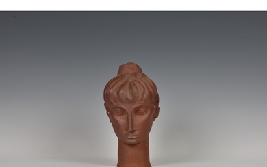 A rare Guernsey Pottery terracotta female bust, signed and d...