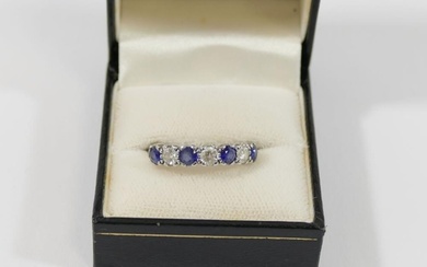 A sapphire and diamond half hoop ring, the three round brill...