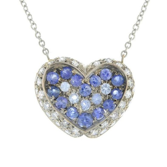 A sapphire and diamond pendant, suspended from an