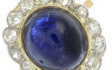 A sapphire cabochon and old-cut diamond cluster ring.