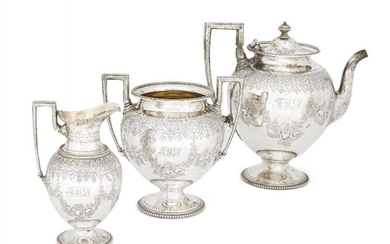 A three-piece silver tea set, London, c.1868,...