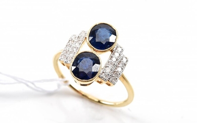 AN ART DECO STYLE SAPPHIRE AND DIAMOND RING, THE TWO BURMESE BLUE SAPPHIRES TOTALLING 2.32CTS AND DIAMONDS ESTIMATED 0.20CT, IN 18CT...