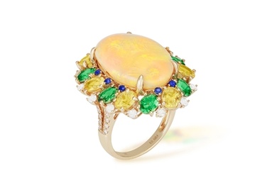 AN OPAL, GEM-SET AND DIAMOND COCKTAIL RING The central oval...