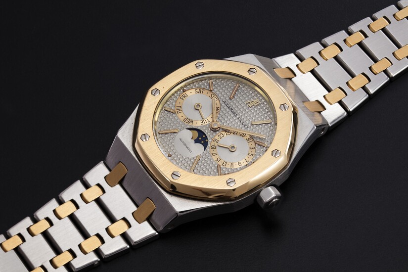AUDEMARS PIGUET, A TWO-TONE DAY-DATE WITH MOON-PHASE, REF. 25594SA