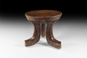 African Three-Legged Stool 19th-20th century AD A carved stool...