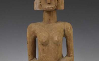 African carved wooden kneeling fertility figure