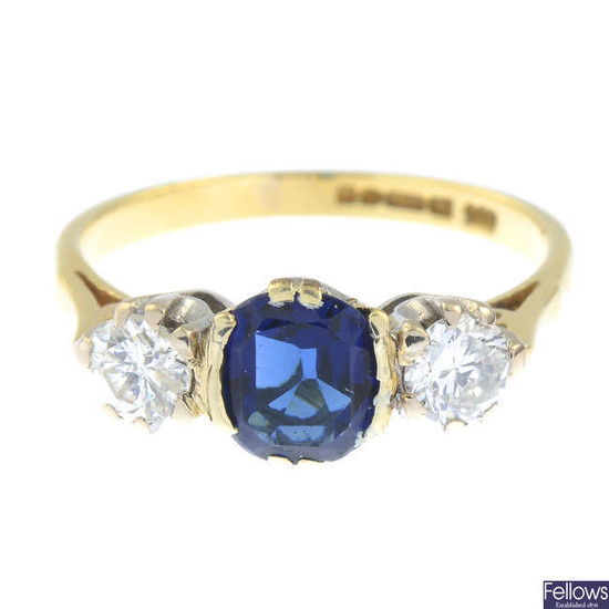 An 18ct gold blue paste and brilliant-cut diamond three-stone ring.