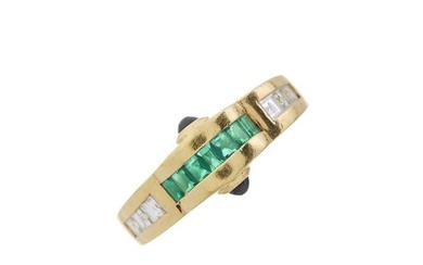 An 18ct gold emerald, diamond and sapphire dress ring