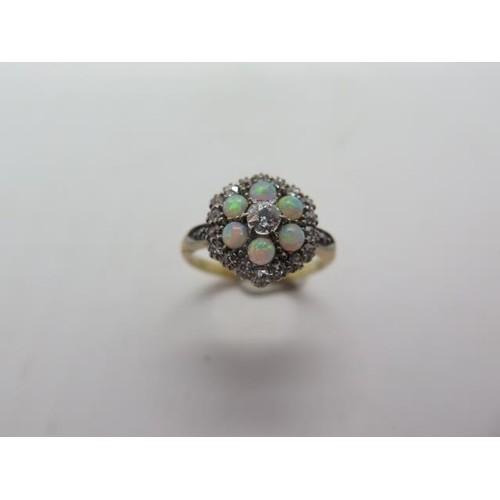 An 18ct yellow gold diamond and opal cluster ring, head appr...