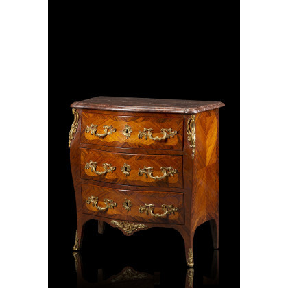 An 18th-century French bois de rose and bois de violette veneered commode. Gilt bronze mounts, marble top of a later...