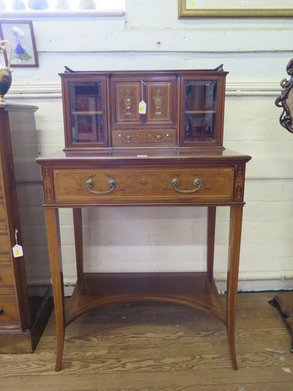 An Edwardian inlaid mahogany lady's secretaire, the top with...