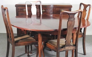 An Edwardian sideboard, together with a dining table and set...