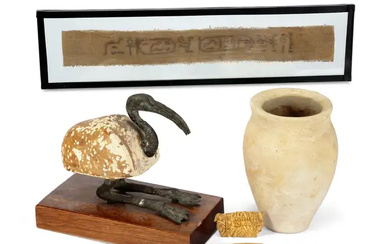 An Egyptian Ibis, an inscribed textile fragment, stone pot and two gold...