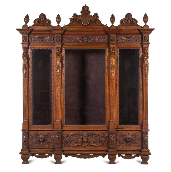 An Italian Renaissance Style Carved Walnut Cabinet
