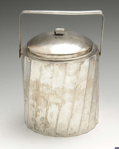 An Italian silver swing-handled ice bucket, marked Cartier.