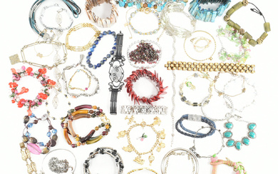 An assorted collection of costume jewellery bracelets. The lot to include; gold & silver tone jewellery, bangles, bracelets, chains, beads, shell, glass, lapis lazuli, niello, sequins, white stones, flowers, abalone shell, various coloured stones...