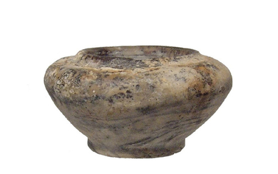 An attractive Egyptian footed kohl vessel, Old Kingdom