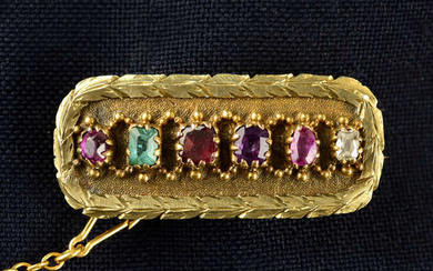 An early 19th century gold multi-gem 'REGARD' acrostic mourning brooch, hinged to reveal a glazed locket.