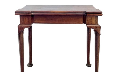 An early George III mahogany fold top tea table. With angled...