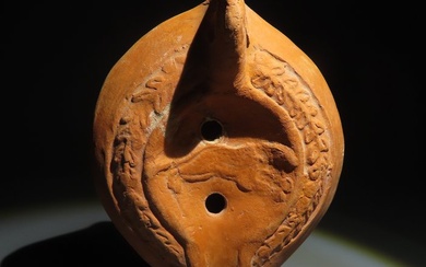 Ancient Roman Terracotta Oil Lamp. 1st-3rd century AD. 13 cm length.