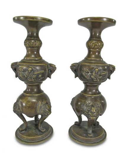Antique Asian pair of bronze candlesticks
