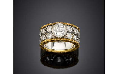 Bi-coloured chiseled gold ring with an old mine ct. 1.15 circa diamond accented with smaller diamonds, g 9.51 circa size...