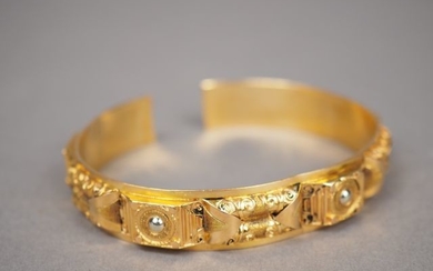Bracelet jonc en or jaune, à décor de...