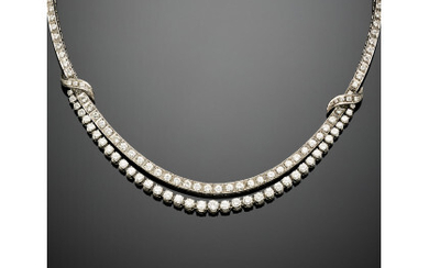 Brilliant cut diamond platinum necklace with central festoon in all ct. 9.00 circa, g 41.80 circa, length cm 41 circa.