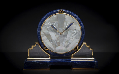 CARTIER, AN ATTRACTIVE LAPIS LAZULI DESK CLOCK WITH MOTHER OF...