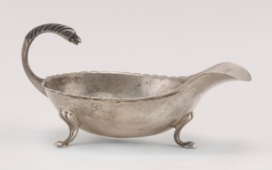 CENTRAL OR SOUTH AMERICAN .930 SILVER GRAVY BOAT With bird-form handle and three scrolled feet. No maker's mark or monogram. Length...