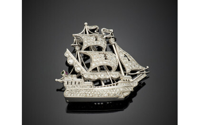 CUSI Platinum sailing ship shaped brooch with round and baguette diamonds, g 18.68 circa, length cm 3.80 circa. Marked 20...