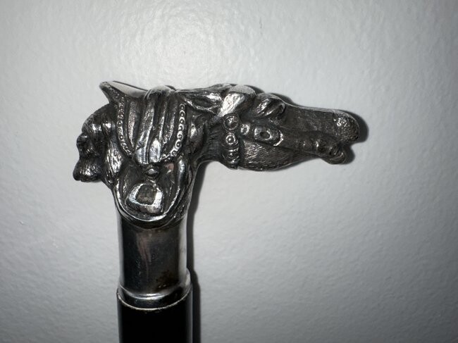 Cane with sterling silver handle of horse