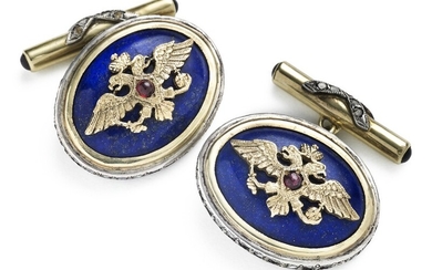 Carl Fabergé: A pair of Russian Fabergé presentation 14k gold, silver and lapis lazuli cufflinks set with the Imperial Warrant. Original case enclosed. (3).