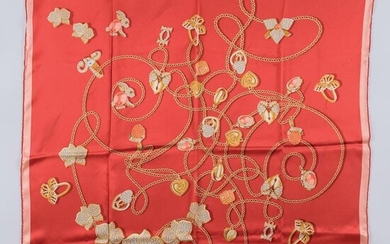 Cartier, a red silk scarf