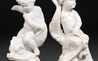 "Children riding dolphins" Set of two enameled figures in capo...