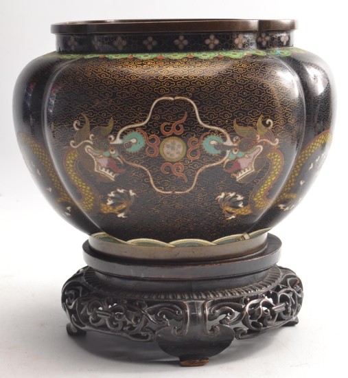 Chinese Cloisonné vase on carved stand