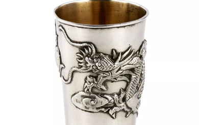 Chinese silver cup with a dragon.