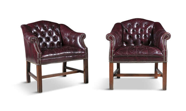 Description A PAIR OF BUTTON BACK LEATHER CLUB CHAIRS,...