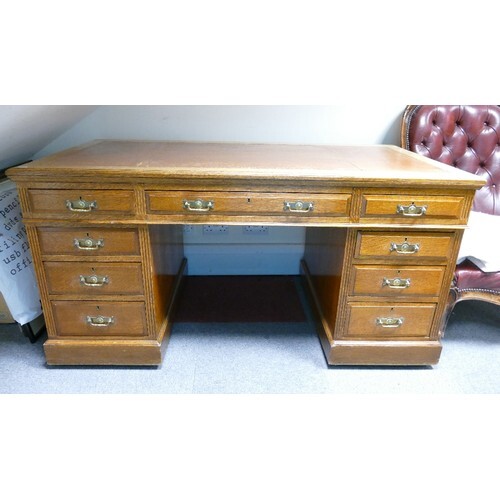 Edwardian Oak pedestal writing desk: Measures 152cm x 82cm x...