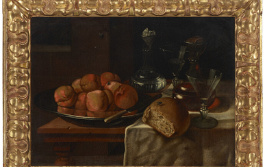 FRENCH SCHOOL, 17TH CENTURY A still life with a silver charger of peaches, bread, and wine, on a table