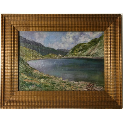 Firma indecifrata "Lago alpino" olio su tela applicata a tavola (cm 45x14) Firmato in basso a destra. In cornice in...