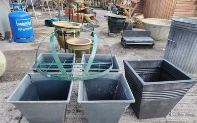 Five large plastic square plant pots, 32cm tall and large me...