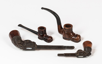 Four Figural Pipes