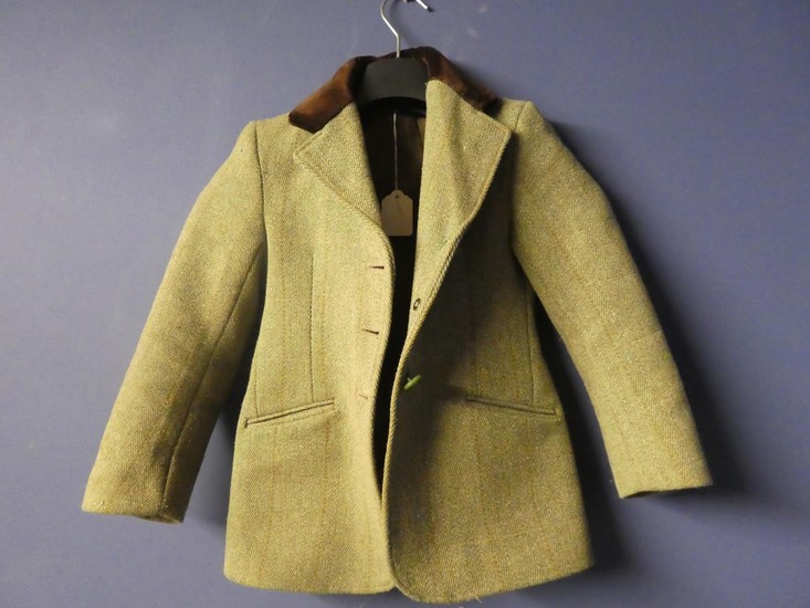 Good quality child's tweed hacking jacket, with brown velvet...