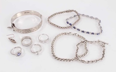 Group of silver jewellery to include a bangle with engraved scroll decoration (Birmingham 1981), two gem set bracelets, two other chain bracelets, four gem set rings and one seahorse earring