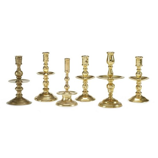 Group of six brass "Heemskerk" candlesticks, Dutch
