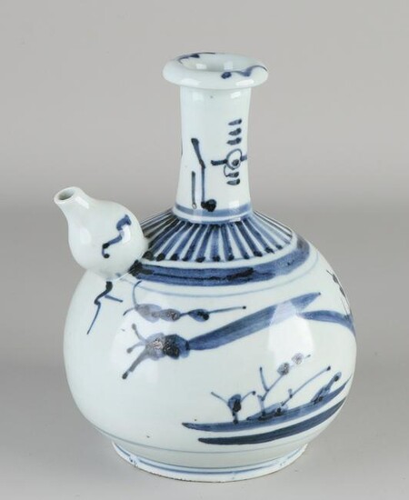 Japanese porcelain ghendi pitcher with floral