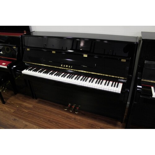 Kawai (c2013) A Model K-15E upright piano in a modern style ...