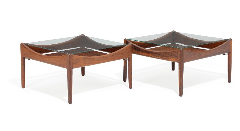 Kristian S. Vedel: “Modus”. A pair of rosewood coffee tables with glass top. Manufactured by Søren Willadsen. H. 33. L. 55. W. 55 cm. (2)